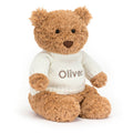 Ours Bartholomew avec pull crème personnalisé