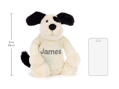 Chiot timide noir et crème avec pull crème personnalisé