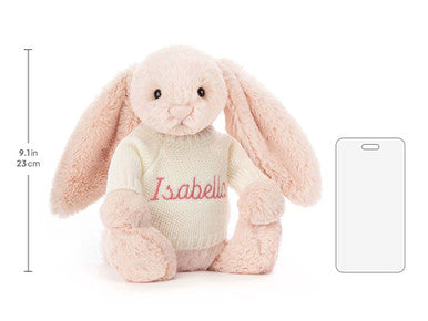 Lapin blush timide avec pull crème personnalisé