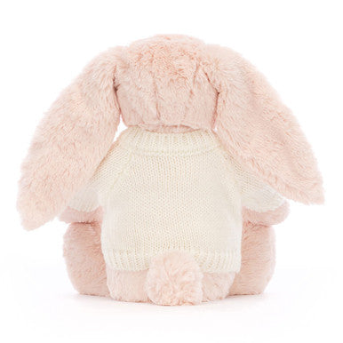 Lapin blush timide avec pull crème personnalisé