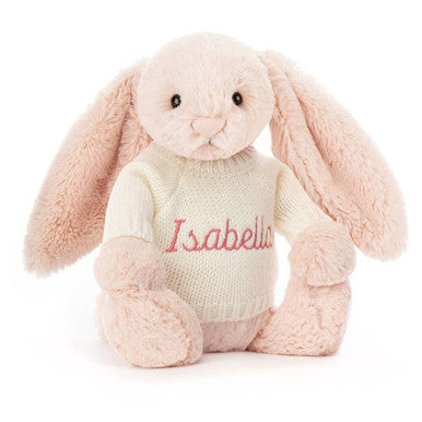 Lapin blush timide avec pull crème personnalisé