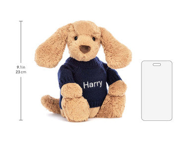 Chiot timide au caramel avec pull bleu marine personnalisé