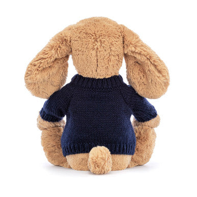 Chiot timide au caramel avec pull bleu marine personnalisé