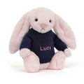 Lapin rose timide avec pull bleu marine personnalisé