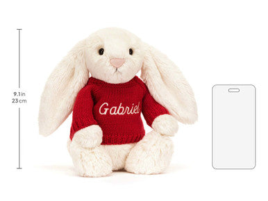 Lapin crème timide avec pull rouge personnalisé