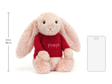 Lapin timide timide avec pull rouge personnalisé