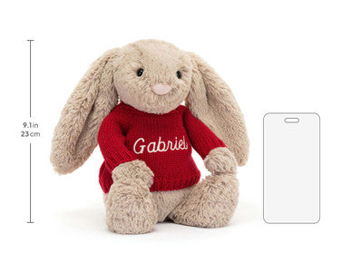 Lapin beige timide avec pull rouge personnalisé