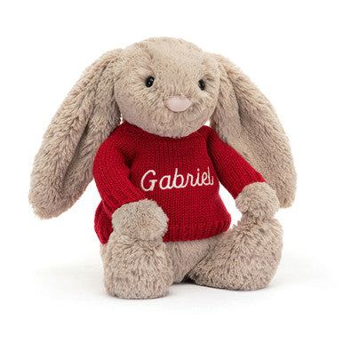Lapin beige timide avec pull rouge personnalisé