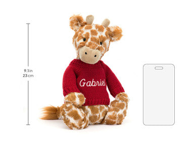 Girafe timide avec pull rouge personnalisé