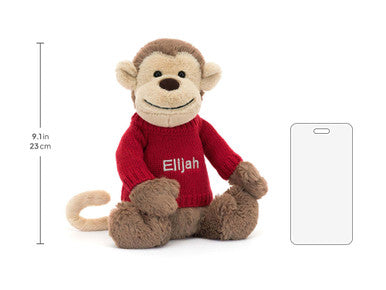Singe timide avec pull rouge personnalisé
