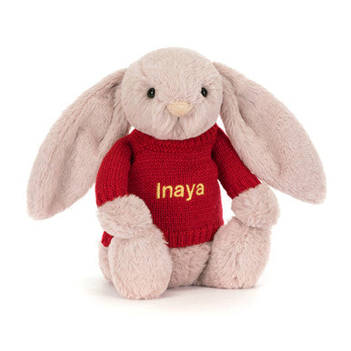 Bashful Luxe Bunny Rosa avec pull rouge personnalisé
