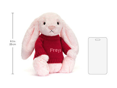 Lapin rose timide avec pull rouge personnalisé