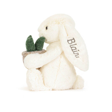 Lapin crème personnalisé avec plante
