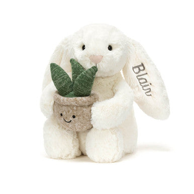 Lapin crème personnalisé avec plante