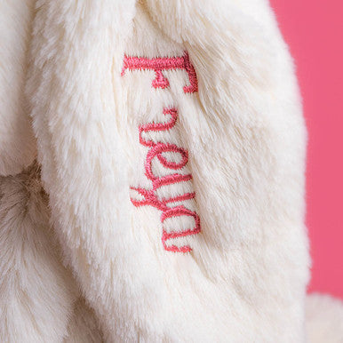 Lapin crème personnalisé avec rose